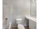 Clean bathroom includes tub, shower, toilet, and vanity, creating a functional and tidy space at 1793 Western Hills Ln # N, Mascotte, FL 34753