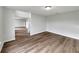 Open living room featuring stylish flooring and neutral paint, offering a bright and airy atmosphere at 1793 Western Hills Ln # N, Mascotte, FL 34753
