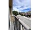 Exterior balcony overlooking the community, with great views of the neighborhood and blue skies at 1984 Estancia Circle # 29A, Kissimmee, FL 34741