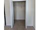 Open closet featuring double doors and wire shelving, offering ample storage space for an organized lifestyle at 1984 Estancia Circle # 29A, Kissimmee, FL 34741