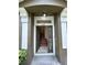 Open front door reveals a staircase leading to the upper floors at 1984 Estancia Circle # 29A, Kissimmee, FL 34741
