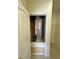 Utility closet featuring HVAC equipment and storage potential with attached shelving at 1984 Estancia Circle # 29A, Kissimmee, FL 34741