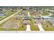 An aerial view of a home with a spacious lot in a well-maintained suburban neighborhood at 205 Cimarron Dr, Kissimmee, FL 34759