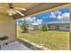 The backyard features a covered patio, shed, and ample grassy space, perfect for entertaining or relaxing at 205 Cimarron Dr, Kissimmee, FL 34759