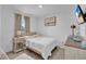Cozy bedroom with neutral tones, ambient lighting, and flat screen TV for a relaxing retreat at 205 Cimarron Dr, Kissimmee, FL 34759