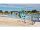 A community pool with a slide, shallow water, and plenty of space to relax at 205 Cimarron Dr, Kissimmee, FL 34759