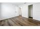 Empty bedroom with closet and view to the hallway at 2160 Churchill Downs Cir, Orlando, FL 32825