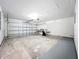 Spacious two car garage with an automatic door and room for storage at 2160 Churchill Downs Cir, Orlando, FL 32825