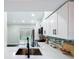 Updated kitchen features modern appliances, quartz countertops, and an open layout at 2160 Churchill Downs Cir, Orlando, FL 32825