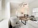 Open-concept living room boasts natural light, vaulted ceilings, and stylish decor at 2160 Churchill Downs Cir, Orlando, FL 32825