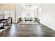 Inviting living room with wood floors, vaulted ceilings, and comfortable seating at 2160 Churchill Downs Cir, Orlando, FL 32825
