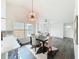 Open concept living with dining area, seamlessly connected to modern living space at 2160 Churchill Downs Cir, Orlando, FL 32825