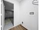Utility room with access to the garage and equipped with hookups for a washer and dryer at 2160 Churchill Downs Cir, Orlando, FL 32825