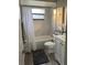 Bright bathroom featuring a bathtub with shower, toilet, and white vanity at 258 Magellan Dr, Kissimmee, FL 34758