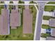 Bird's-eye view highlighting the neighborhood layout and neatly arranged residences at 2601 Blowing Breeze Ave, Kissimmee, FL 34744