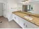 Bathroom features a vanity with granite countertop at 2679 Rainbow Springs Ln, Orlando, FL 32828
