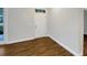 Bright living room with beautiful hardwood flooring and ample natural light at 2679 Rainbow Springs Ln, Orlando, FL 32828