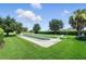 Bocce ball court nestled in a green space offering an outdoor recreational opportunity at 2895 Apache Ct, The Villages, FL 32163