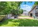 Spacious backyard with a wooden deck, patio, and grill, perfect for outdoor entertaining at 333 Sonoma Valley Cir, Orlando, FL 32835
