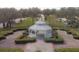 Aerial shot of a gazebo in a well-manicured and designed garden area at 3446 Soho St # 108, Orlando, FL 32835