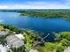 Expansive aerial view of a scenic lake community with lush greenery at 3446 Soho St # 108, Orlando, FL 32835