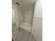 Bathroom showcasing a tub and shower combo with modern fixtures and stylish tile at 3446 Soho St # 108, Orlando, FL 32835