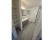 A bathroom featuring modern vanity with great storage, sleek fixtures, and a tiled floor at 3446 Soho St # 108, Orlando, FL 32835
