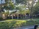 Exterior view of the community featuring an outdoor dining area at 3446 Soho St # 108, Orlando, FL 32835