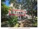 Condo with mature trees and manicured lawn at 3446 Soho St # 108, Orlando, FL 32835