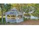 Charming gazebo offers a relaxing retreat near the lake at 3446 Soho St # 108, Orlando, FL 32835