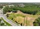 Aerial shot of recreational fields including tennis courts and walking trails near residential area at 3534 Woodley Park Pl, Oviedo, FL 32765
