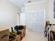Bedroom with a closet and moving boxes at 3534 Woodley Park Pl, Oviedo, FL 32765