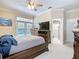 Spacious bedroom offers great natural light, with generous closet space, and ceiling fan at 3534 Woodley Park Pl, Oviedo, FL 32765