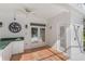 The patio features a built-in kitchen, perfect for outdoor entertaining, with double doors and a shower at 3534 Woodley Park Pl, Oviedo, FL 32765