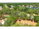 A well maintained playground and park area for families to enjoy with mature trees and a nice lake view at 3534 Woodley Park Pl, Oviedo, FL 32765