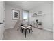 bedroom with a play teepee, small table, and organized shelving at 4409 Lions Gate Ave, Clermont, FL 34711