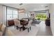 Open dining area with hardwood floors, stylish decor, and lots of natural light at 4409 Lions Gate Ave, Clermont, FL 34711