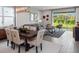 Inviting dining area with hardwood floors, stylish decor, and an open living concept at 4409 Lions Gate Ave, Clermont, FL 34711