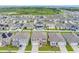 Aerial view of the neighborhood, displaying the lush greenery and community layout at 4644 Bernard Blvd, Haines City, FL 33844