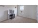 Bright bedroom featuring carpet flooring, natural light, and a desk at 4644 Bernard Blvd, Haines City, FL 33844