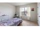Bright bedroom featuring carpet flooring, natural light, and a vanity set at 4644 Bernard Blvd, Haines City, FL 33844
