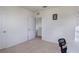 Bright bedroom featuring carpet flooring and an open doorway at 4644 Bernard Blvd, Haines City, FL 33844