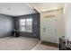 Bright living room with neutral walls, large window and carpeted floors at 4644 Bernard Blvd, Haines City, FL 33844