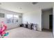 Upstairs loft area with soft carpet and large bright window at 4644 Bernard Blvd, Haines City, FL 33844