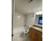 Standard bathroom featuring a single sink with granite countertops, toilet, and a shower and tub combo at 4701 S Texas Ave # 4701A, Orlando, FL 32839