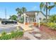 Inviting condominium entrance featuring well-manicured landscaping and ample parking at 4701 S Texas Ave # 4701A, Orlando, FL 32839