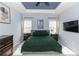 Spacious main bedroom with tray ceiling, plush carpet and lots of natural light at 4733 Cliveden Loop, Sanford, FL 32773