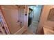 Full bathroom featuring combination shower and bathtub with wood-look flooring at 4905 Newton Ct, St Cloud, FL 34771