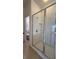 Bathroom featuring a large shower with clear glass enclosure at 513 Bailey Cir, Davenport, FL 33897