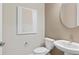 A clean and simple powder room with modern fixtures at 5242 Handsome Hills Dr, Mount Dora, FL 32757